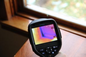*An infrared camera helps find air leaks and places in your home where heat and money are literally going out the window! Photo David Dodge.