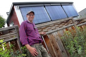 When Cornelius Koster built his inner city garage suite in Calgary, Alberta he installed 5.5 kilowatts of solar PV to generate electricity and 12.5 kilowatts of solar thermal collectors to supply more than enough hot water and heat for the suite. Excess energy is exported to the main house making the garage suite net-positive in terms of energy. Photo David Dodge, GreenEnergyFutures.ca