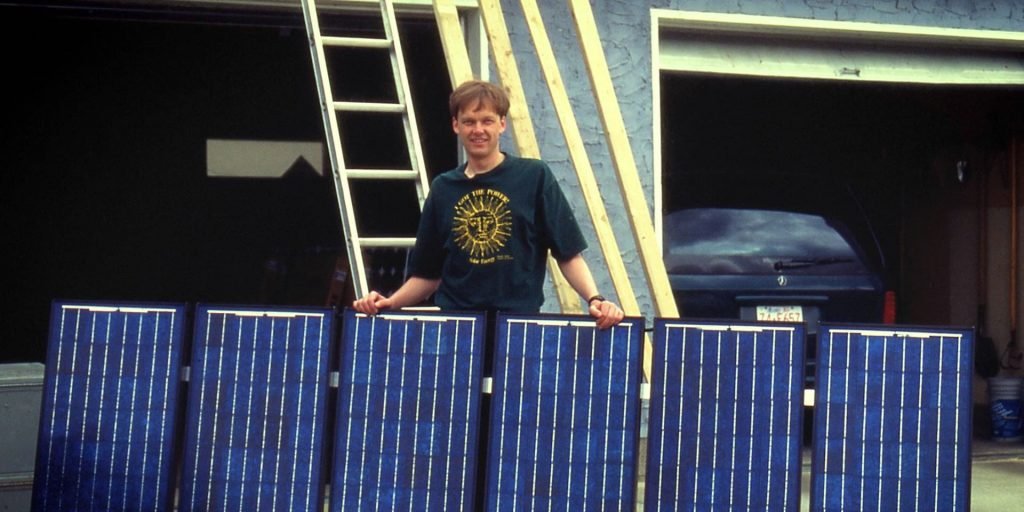 Gordon Howell installing first solar system