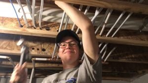 203. Rae-Anne Wadey – A Diesel Truck or a Career in Solar 3 Pulling wires