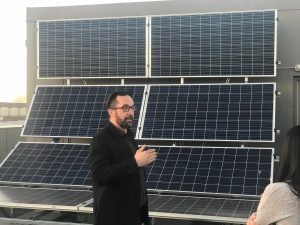 David Pye, Associate Dean with reference solar array