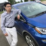 Kevin Ma with his Chevy Bolt.