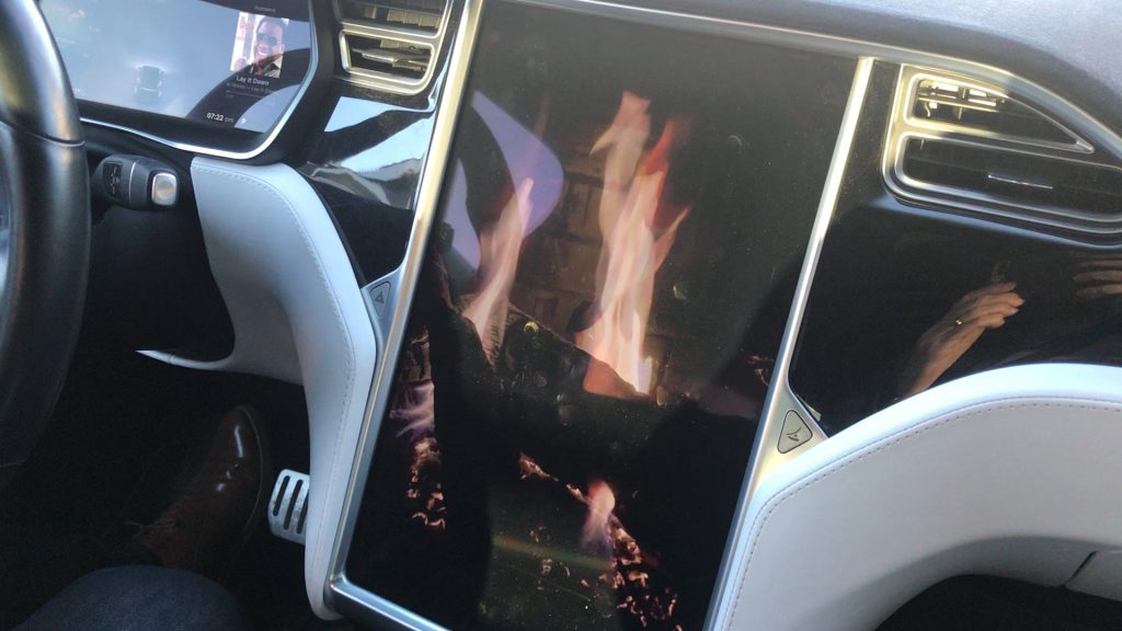 Tesla Model X EV showing Romance Mode in its 17-inch screen. 