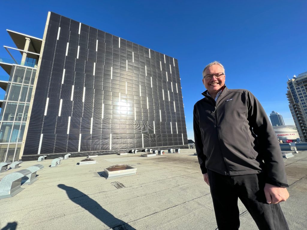 David Kelly of SkyFire Energy at the 107th Street Annex in Edmonton where they worked with local Architect Gene Dub adding vertical solar as an architectural feature on the south face of the building. 